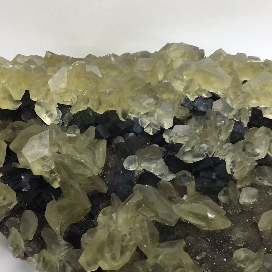 Yellow calcite on fluorite
