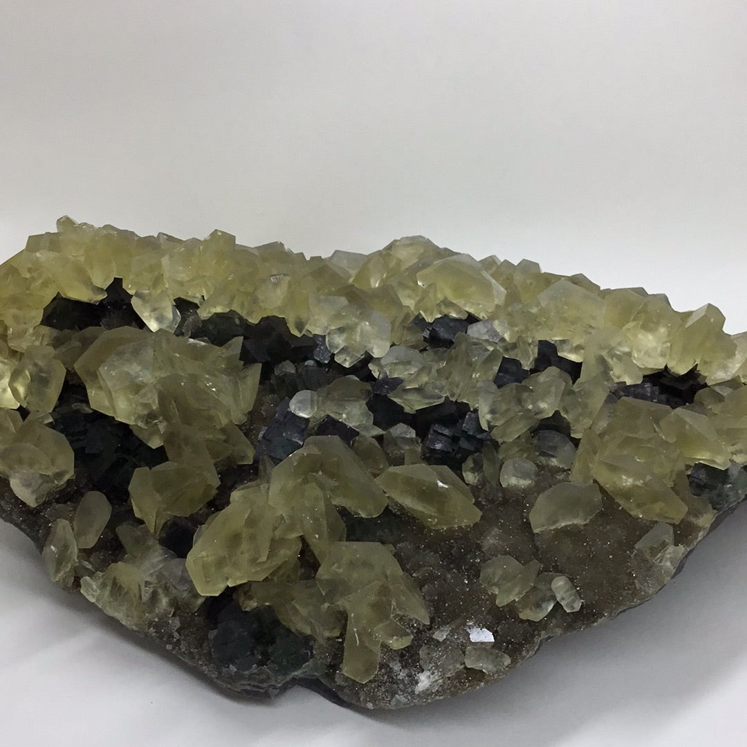 Yellow calcite on fluorite