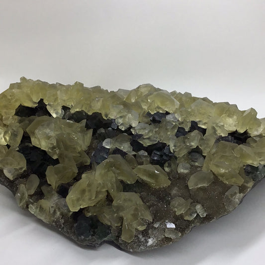 Yellow calcite on fluorite