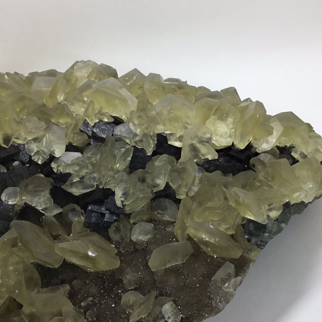 Yellow calcite on fluorite